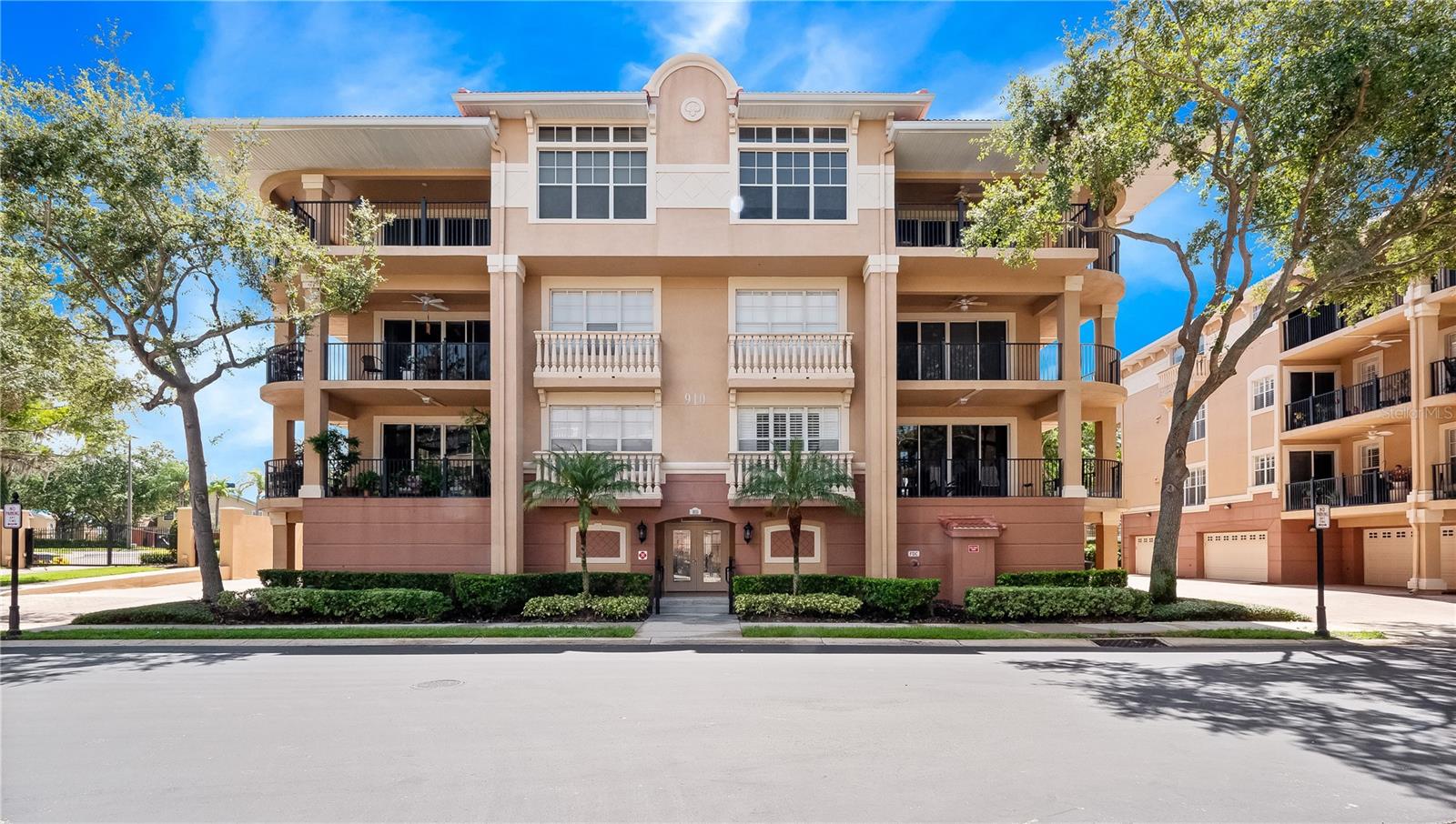Welcome to Lotus Vista—Seminole County’s best-kept secret—where luxury meets tranquility in a serene, gated community just minutes from shopping, dining, and major highways.
This spacious end-unit condominium offers 3 bedrooms plus an office (or 4th bedroom), 2.5 bathrooms, and nearly 2,300 square feet of thoughtfully designed living space. The open layout features two living/family rooms, a formal dining area, a breakfast nook, and a wraparound covered balcony—perfect for both everyday comfort and effortless entertaining. Abundant natural light fills the home, enhancing its airy, inviting atmosphere.
The gourmet kitchen is a chef’s dream, with 42-inch cabinetry, granite countertops, a center island, and stainless steel appliances. A spectacular three-way split floor plan ensures privacy for all, with the primary suite in its own wing. This retreat features a tray ceiling, large picture window, and sliding doors to the balcony. The en suite bath which leads to a generous walk-in closet complete with custom shelving includes double sinks, large shower and a vanity mirror with seat. Two additional bedrooms share a well-appointed full bath on the opposite side of the home, while the 4th bedroom—currently used as an office—offers double French doors, built-in storage, and convenient access to the powder bath. The wraparound balcony connects seamlessly to the family room, primary bedroom, and kitchen, creating a natural flow for gatherings.
Additional highlights include a centrally located laundry room with utility sink and cabinetry, an oversized two-car garage with in-building storage, and elevator access. All this comes with a low-maintenance lifestyle that feels like a single-family home—without the upkeep.
Lotus Vista’s amenities include a newly renovated clubhouse, sparkling pool, and impeccably maintained grounds within a private enclave of just 54 residences. This home is a great primary or second home option with its amazing Central Florida location and ease of maintenance - community water, sewer, cable/internet and trash rolled into one management fee. With its ideal location near dining, shopping, medical facilities, and quick access to I-4 and the 414, this property offers a rare combination of comfort, convenience, and exclusivity. One or more photos were virtually staged.