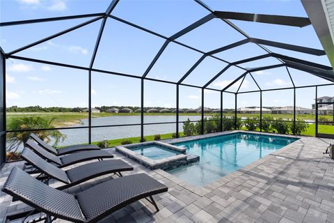 Photo of 10030 Degas Terrace, Bradenton, FL 34212 (MLS # A4653952)