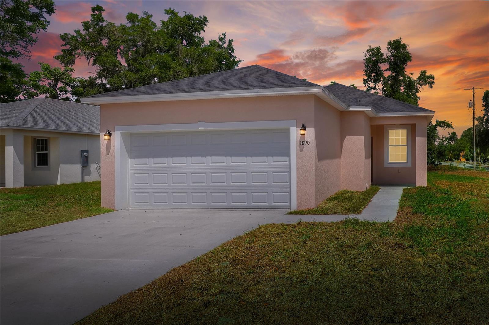 Live the Florida lifestyle in this BRAND-NEW construction home located on a desirable corner lot in Bartow. This thoughtfully designed 3-bedroom, 2-bathroom home features soaring 10-foot ceilings, an open floor plan with over 1,100 square feet of living space, and a 2-car garage. The modern kitchen boasts granite countertops, white shaker cabinets, and stainless-steel appliances. Luxury vinyl plank flooring runs throughout the home for easy maintenance and a cohesive look. The primary suite includes a walk-in closet and en-suite bathroom with granite counters. Conveniently located just minutes from Bartow’s historic downtown, Highway 60, and the Polk Parkway for easy commuting to Tampa, Orlando, or Brandon. Rent is $1,850/month, security deposit is $1,900 WE OFFER A SECURITY DEPOSIT ALTERNATIVE. The application fee is only $80/adult. In addition to the advertised base rent, all Lakeland Homes and Realty tenants are enrolled in the Resident Benefits Package (RBP) for $50/month (ex.: $1,850 (base rent) + $50 (RBP) = $1,900 (total monthly charge), which includes HVAC air filter delivery to your door (for applicable properties), credit building to help boost your credit score with timely rent payments, $1M Identity Protection, $100K Personal Property insurance, utility concierge service making your move-in less stressful, our resident rewards program benefits, and much more! More details upon application.