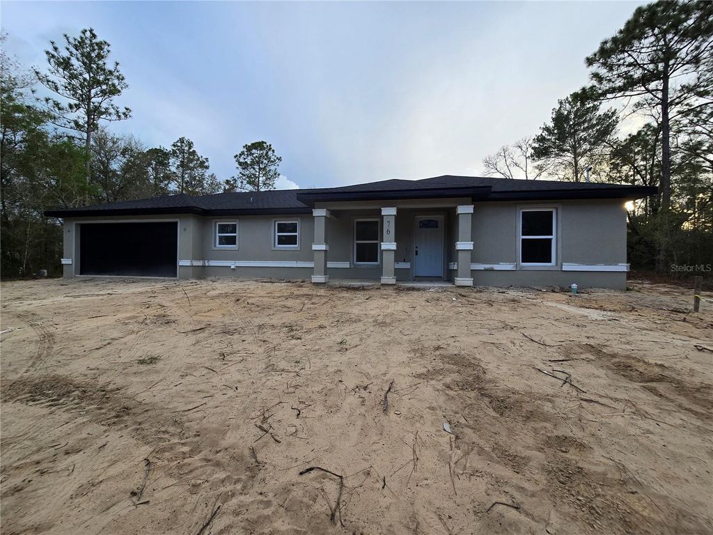 Photo of 76 Locust Loop, Ocala, FL 34472 (MLS # OM720793)