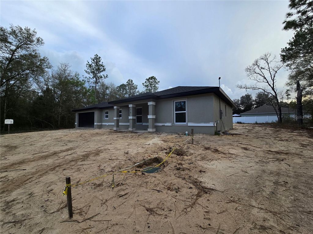 Photo of 76 Locust Loop, Ocala, FL 34472 (MLS # OM720793)