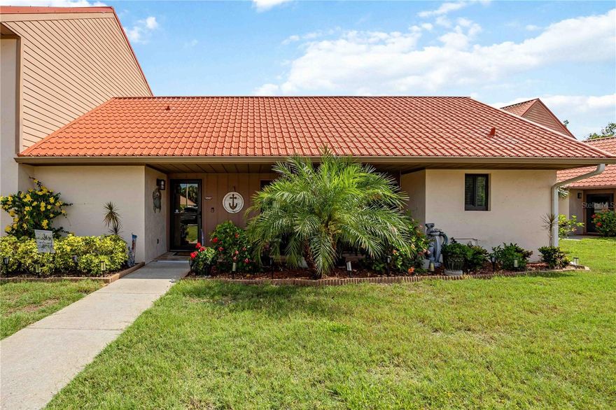 Hidden away in one of Sarasota’s best-kept secrets, Sunrise Condominium offers a peaceful setting with winding roads, scenic ponds, and abundant birdlife creating a true sense of tranquility. This beautifully remodeled villa features two spacious primary suites, each with walk-in closets and private en-suite bathrooms, making it ideal for guests, seasonal living, or full-time comfort.

Thoughtfully updated from 2020–2025, this move-in-ready home showcases quality improvements throughout, including impact windows and doors (2025), HVAC system with UV light and added insulation (2024), an updated kitchen (2020), luxury vinyl flooring throughout, remodeled bathrooms, interior paint, and new interior doors (2021).  Ask your realtor for a full list of improvements!

The vaulted ceiling in the great room enhances the open and airy feel while maintaining a warm, inviting atmosphere. Sliding doors lead to a private rear paver patio overlooking peaceful pond and wooded views — the perfect place to relax, entertain, or enjoy grilling outdoors. The charming front porch, also finished with pavers, provides another inviting space to enjoy the lush surroundings and colorful landscaping.

Sunrise Condominium offers maintenance-free living with reasonable quarterly fees that include landscaping, irrigation, and exterior pest control. Residents enjoy access to a sparkling community pool, tennis court, and quiet streets perfect for walking or biking.

The location is exceptional — just minutes to I-75, shopping, dining, and medical facilities, while nearby Clark Road provides a direct route to world-famous Siesta Key Beach, where you can be enjoying the Gulf waters and sandy beaches in approximately 15 minutes.

If you’ve been searching for an updated villa in a peaceful Sarasota setting with convenience, charm, and low-maintenance living, this is one you won’t want to miss.