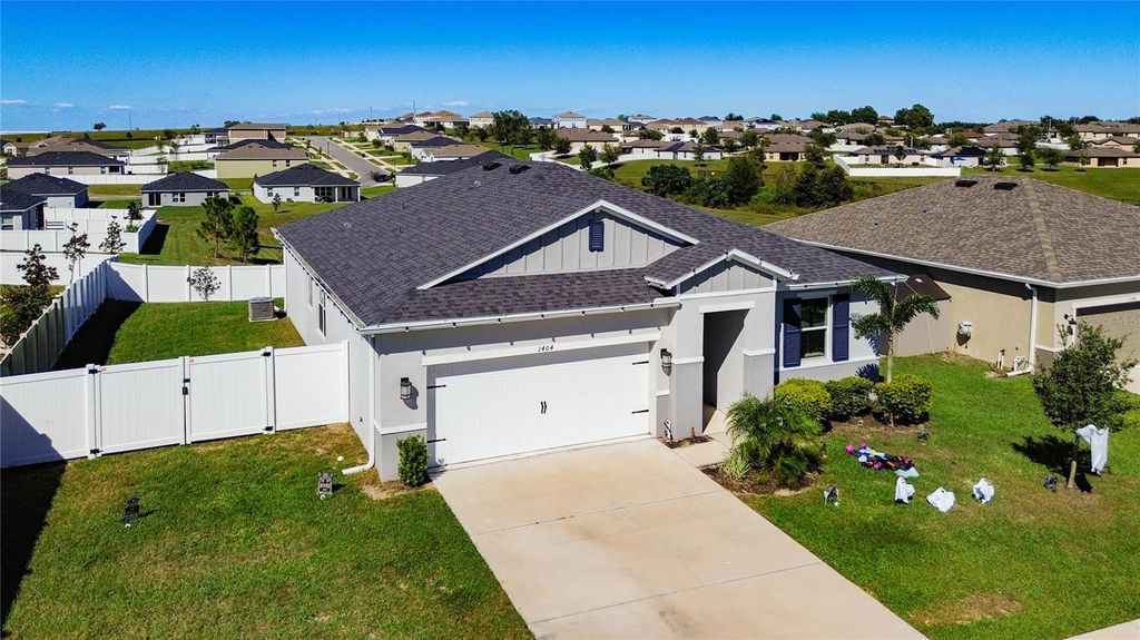 Photo of 1404 Geranium Drive, Mascotte, FL 34753 (MLS # S5136748)