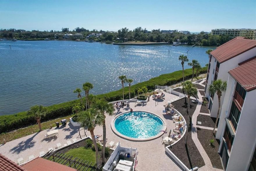 AVAILABILITY: May, June, July, August 2025: $2,000/month plus fees & taxes September & October 2025: $2,400/month plus fees & taxes Discover the epitome of coastal living in this inviting 2-bedroom 1st floor condominium, strategically nestled just steps away from one of two heated pools, offering an ideal blend of comfort and convenience. This resort-style community, ideally located on the Intracoastal Waterway offers two pools, one of which is situated right on Sarasota Bay, providing breathtaking water views and sunsets. Additional amenities include a bayside gazebo, kayak racks and launch area, tennis courts, pickleball courts, shuffleboard, and a boardwalk that surrounds the bay area. The master bedroom boasts a luxurious ensuite bathroom and a queen-sized bed, while the second bedroom features two full beds and generous closet space. The well-appointed kitchen seamlessly flows into the cozy living area. Adding to the allure is the proximity to essential amenities - a quick 12-minute walk to the pristine Siesta Key Beach and a mere 10-minute stroll to dining, shopping, jet ski rentals, and more. Immerse yourself in the vibrant island lifestyle with the option to bike to Siesta Key Village or take the Free Trolley after a leisurely walk over the bridge.
The laundry room is conveniently just steps away. Leave your car behind and embrace the freedom of walking everywhere. Seize the opportunity to make this slice of paradise your own. Monthly rates vary on seasonal months, please inquire for accurate pricing