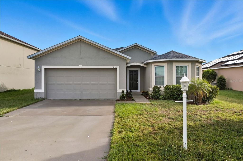 Photo of 6126 Forest Ridge Way, Winter Haven, FL 33881 (MLS # TB8435087)