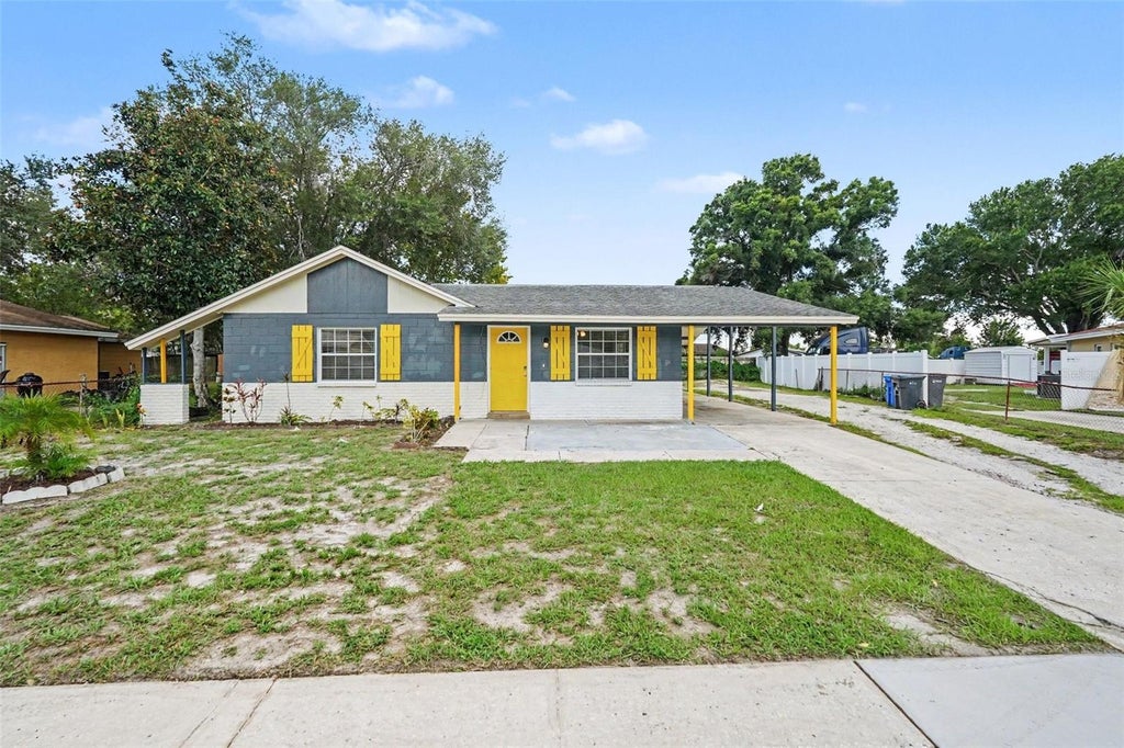 Photo of 8503 Fish Lake Road, Tampa, FL 33619 (MLS # O6439324)