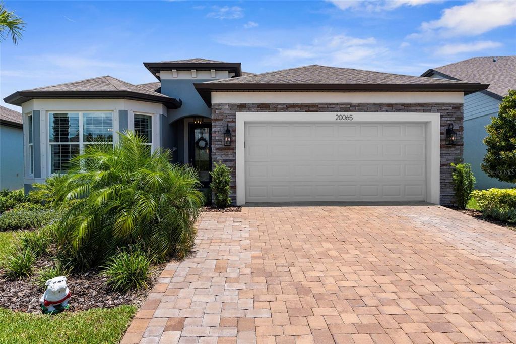 Photo of 20065 Sea Glass Circle, Land O Lakes, FL 34638 (MLS # TB8408163)