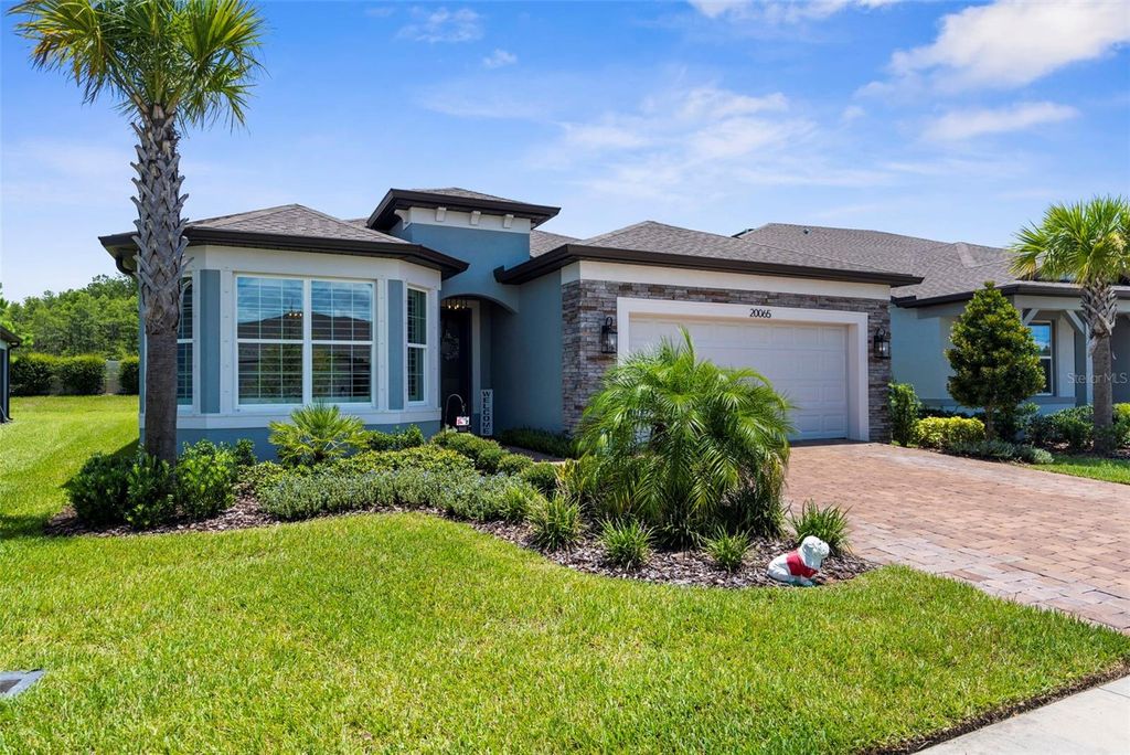 Photo of 20065 Sea Glass Circle, Land O Lakes, FL 34638 (MLS # TB8408163)