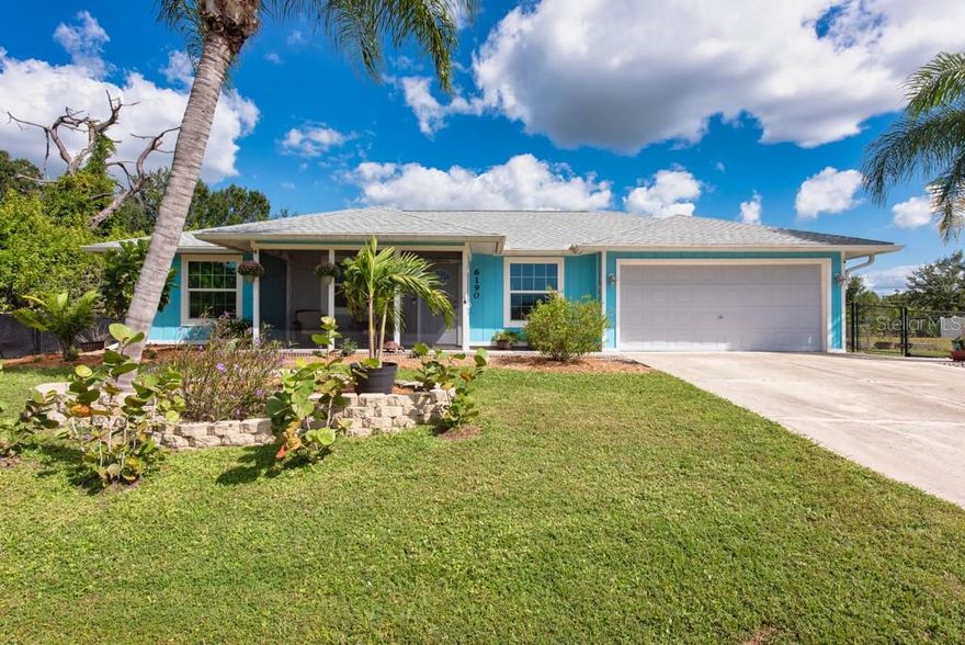 Expansive double lot offers endless possibilities—whether you’re looking to enjoy the extra space, create your dream backyard oasis, or explore the potential to build an additional home. The separate parcel of .23 acres is included, bringing the total lot size to nearly half an acre, providing exceptional value and flexibility rarely found in this area. Nestled on the Port Charlotte–Englewood line, this beautifully updated 2-bedroom, 2-bathroom home offers the perfect blend of comfort, modern updates, and coastal convenience—just 15 minutes from the Gulf beaches. With no HOA, no CDD, and no deed restrictions, you’ll have the freedom to make this property truly your own. Step inside and discover 1,342 square feet of thoughtfully designed living space, featuring two separate living areas ideal for entertaining or creating a private guest retreat. The new kitchen boasts a wide countertop workspace, breakfast bar/island, ample cabinetry, and a tray ceiling that adds architectural charm. Both bathrooms have been completely renovated, complementing the home’s fresh, modern appeal. Additional highlights include a new roof, a new HVAC system, and new impact windows for peace of mind and energy efficiency. The home features tile flooring throughout, offering easy maintenance and a clean, cohesive look. The large master bedroom includes an oversized closet, while the spacious indoor laundry room comes equipped with a ceiling fan and built-in storage cabinet. Completing the property is a 2-car garage and a huge storage shed, perfect for keeping tools, recreational gear, and any hobby essentials neatly organized. Outdoor living is where this property truly shines — with a screened front porch, screened back patio, new paver patio, and extensive walkways connecting your outdoor spaces. The fully fenced backyard offers exceptional privacy and plenty of room for a pool, garden, or additional structure on the adjoining parcel. Whether you’re seeking a peaceful year-round residence, a seasonal retreat near the beach, or an investment opportunity with expansion potential, this Englewood gem delivers space, style, and freedom—all in one property. ***FREE 1/0 Rate Buy Down when using the seller's preferred lender!***