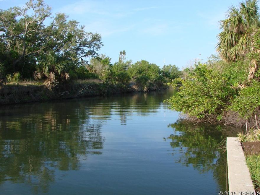 YOU'RE IN LUCK!  BACK ON MARKET!! This beautifully detailed canal-front home features a modern open floorplan and upscale finishes nestled in the natural beauty of old-world Florida.  Quality-built by Palm Harbour Homes, this luxury 3-bedroom, 2- bath model provides amazing water and nature views from all common areas of the home.  The private Master Suite overlooks the canal and dock, has large handicap accessible bathroom and provides easy access to the adjoining laundry room.  On the other side of the residence are two light and airy bedrooms and a full bath with skylight.  Tray ceilings, thoughtfully designed built-ins in living room and dining area, open-concept kitchen with breakfast nook and large serving bar make this upscale waterfront home a "must-see".  Step through the french doors into the tiled Florida Room with builtin wet bar and refrigerator and watch the sunrise over the Intracoastal Waterway.  Outdoor entertaining and grilling is a breeze on the bi-level vaulted screened porch overlooking the water.  And bring your boat!  Tie up to your own private dock or use the community boat launch.  Terra Mar Village has an incredible amenities package featuring two large swimming pools, clubhouse, community boat launch and 300 foot fishing pier directly on the Intracoastal - all for just $115 per month with no HOA fees.  One last thing: this outstanding property includes ownership of your lot!  Listing information thought to be reliable but not guaranteed to be accurate, you are advised to verify the facts that are important to you. ;Water: City
