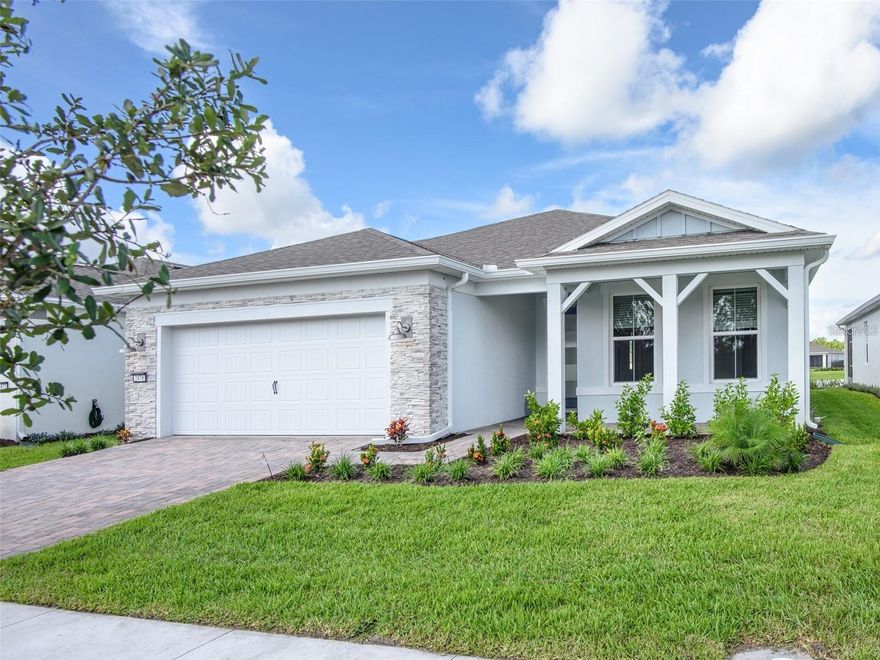 Brand New Move-In Ready! Circumstances changed for this buyer and they are selling their beautiful Mystique Model Home with upgrades galore! This amazing home is located in the DeWebb 55+ community in SunBridge. This community encompasses over 27,000 acres. The "Naturehood" in SunBridge, is 14,000 acres of lakes, oak hammocks and mesmerizing Florida's natural preserve. Sunridge's 2026 plans include a multi-purpose shopping district with high end dining and shopping alongside a new Marina. 

This home is less than 1/2 miles to the full Amenity Hammock Clubhouse. This state of the art facility offers a front desk concierge, large gym with resort style amenities which include multiple work out class rooms, wet and dry arts and crafts rooms, banquet facility with a full kitchen, and enjoy dining at the Tavern Restaurant and Bar that offers dining inside or outside. The resort style pools offer a resistance pool along with lap swimming and zero entry. Please see the attached amenities schedule of ongoing activities! Rest assured you will receive all Pulte's Builder Warranties which include a 1 year, 2 year, and 5 year and a 10 year structural warranty. Owners did many upgrades from extending the living area to adding an extra bedroom from the garage area. This 4 bedroom 3 bathroom home will be a family entertainment delight. The open kitchen has a large bar with the sink and dishwasher. This area is great for casual eating, scrolling or good ole conversation. The kitchen includes upgraded. KitchenAid appliances. Why wait to build wjem you have the opportunity to move in ready home on this upgraded lot with a water view that offer spectacular evening sunsets!