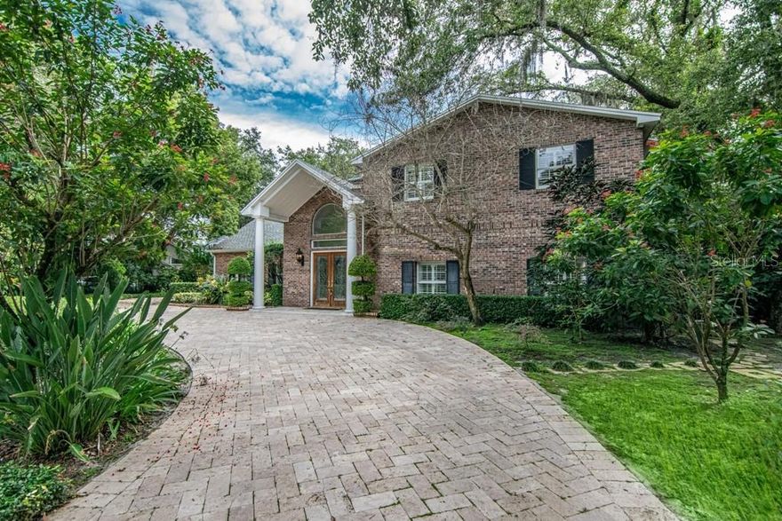 Unbelievable golf course home site! Traditional 2-story brick estate is situated on one of the best settings in Avila, Tampa Bay's premier gated Country Club community. Encompassing
approximately 3800 square feet of air-conditioned living space this renovated residence includes 4 bedrooms, 4 full and 1 half baths pool, and circular drive. Crown moldings and wood floors
are featured throughout most of the rooms. Downstairs offers an inviting foyer and spacious living, dining, and family rooms. Gorgeous granite kitchen opens up to family room with brick
fireplace all overlooking pool and golf course. Upstairs offers a luxurious master suite with office/nursery, and three additional bedrooms. The outdoor entertaining area includes a screened
pool, brick fireplace, outdoor kitchen, lush landscaping, and unbelievable views of the golf course. This home represents the epitome of warmth, spaciousness and comfort!