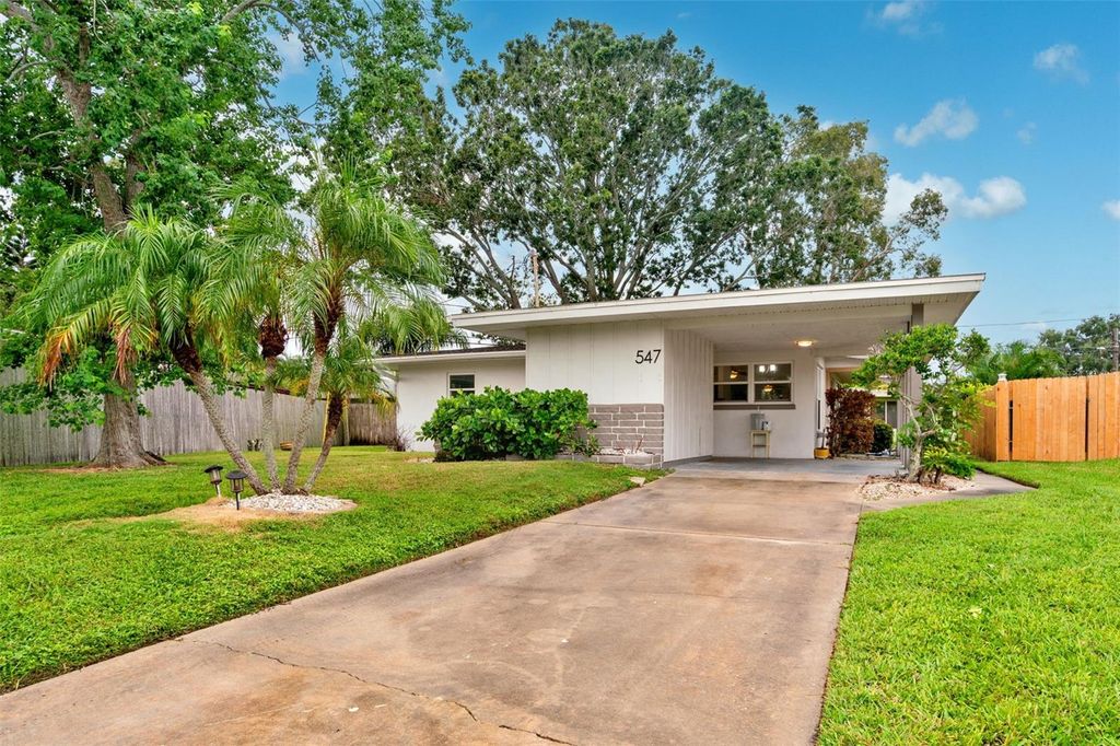 Photo of 547 Trade Winds Drive, Dunedin, FL 34698 (MLS # TB8410736)