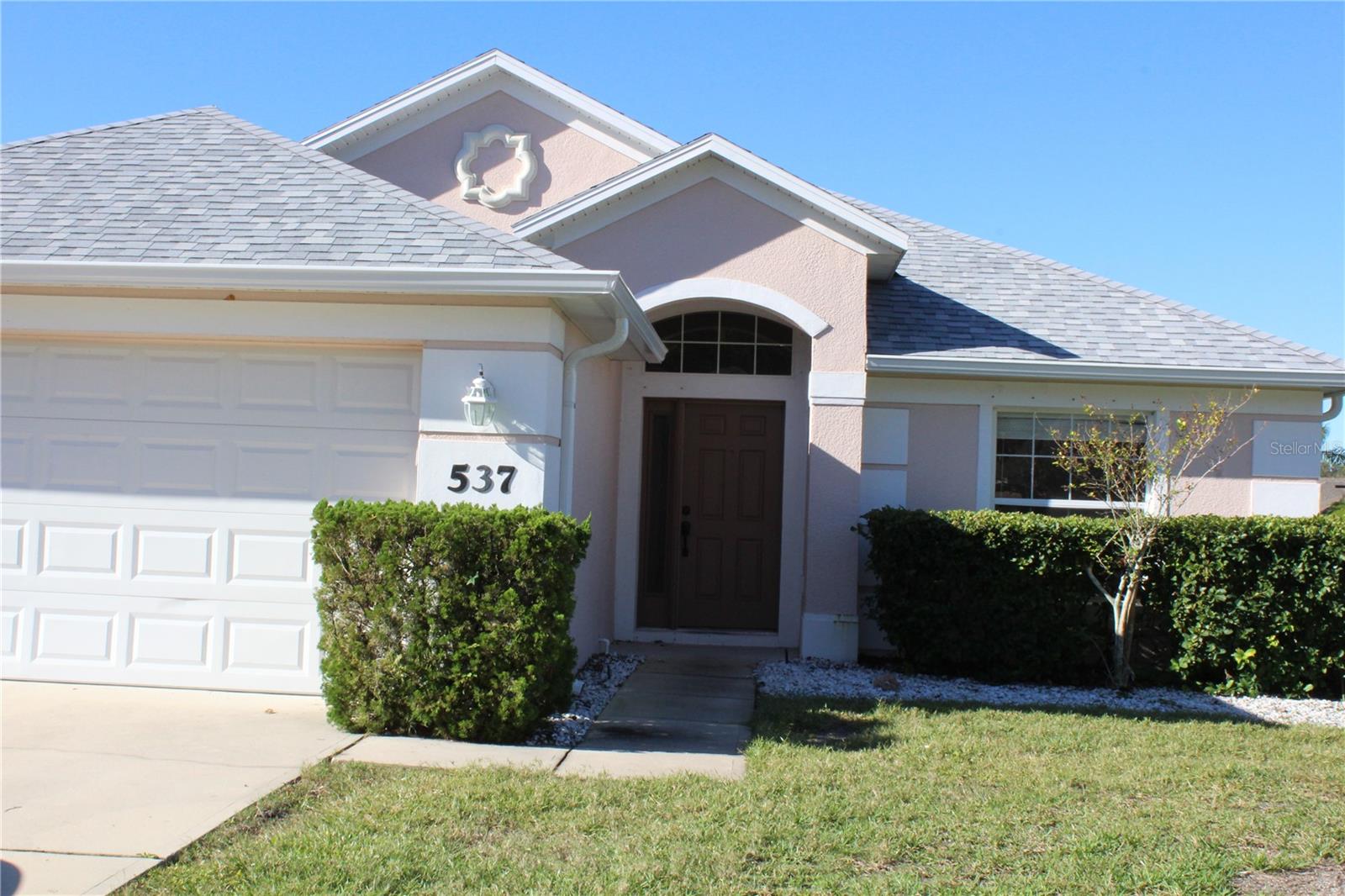 This lovely 3bed/2bath home w/ 2 car garage in gated & sought after Coral Trace. Freshly painted with vinyl plank flooring in living room, dining room & bedrooms. New roof, A/C, hot water heater & gutters, end of 2024. This home must be seen to be appreciated.
All measurements are approximate and information is deemed to be accurate.