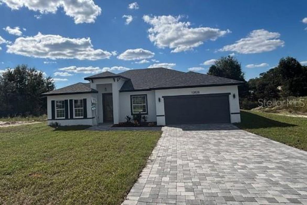 Photo of 12828 SW 73rd Ter, Ocala, FL 34473 (MLS # O6355054)