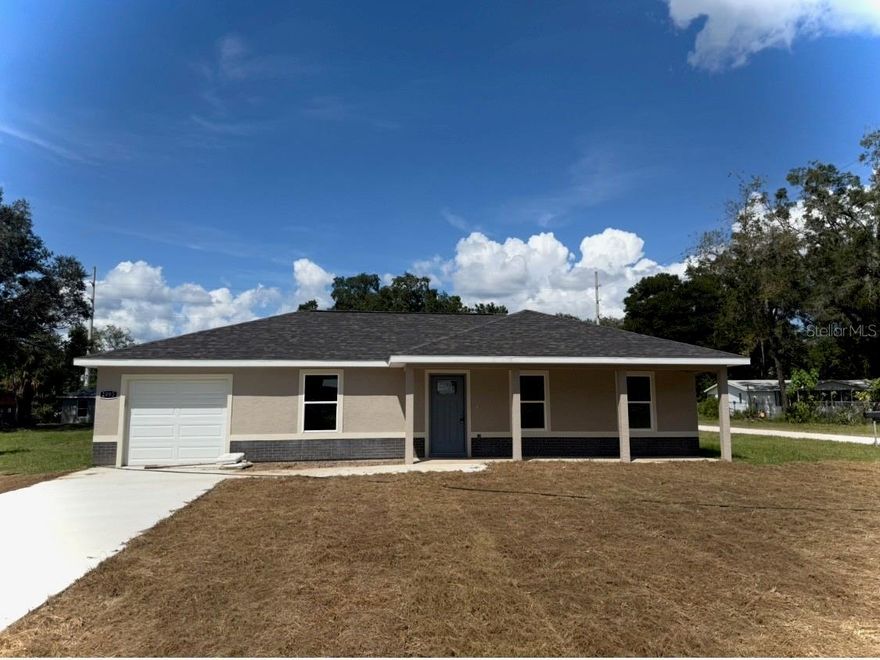 Under Construction. Brand new 3/2 home with 1 car garage and covered front porch.  Conveniently located in growing area of Belleview. Easy access to Ocala, Belleview or The Villages. Enjoy the open concept floor plan with vinyl plank flooring throughout. Kitchen and Baths have granite counter tops and upgraded cabinets. Stainless steel appliances including Range, Refrigerator, Dishwasher and Microwave. Inside laundry room. Remote garage door opener. PHOTOS ARE OF A Destiny MODEL THAT WAS PREVIOUSLY BUILT AND NOT THE ACTUAL LISTING