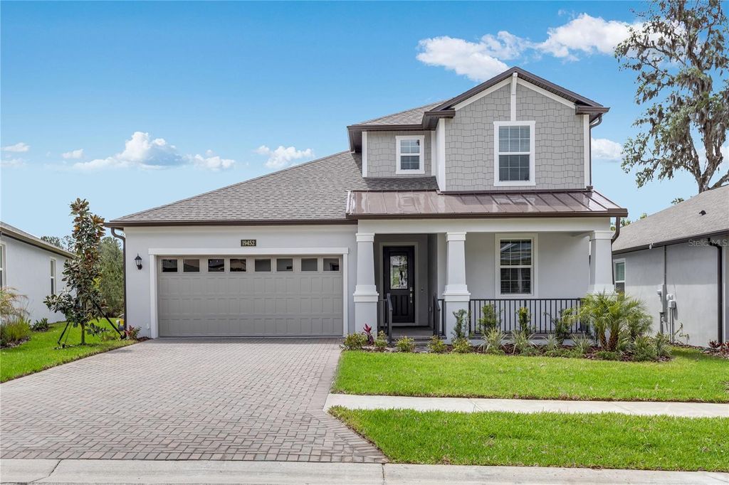 Photo of 19452 Bristol Wood Place, Brooksville, FL 34601 (MLS # TB8304622)