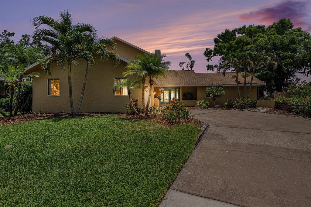Photo of 115 Lake Shore Drive E, Palm Harbor, FL 34684 (MLS # TB8392942)