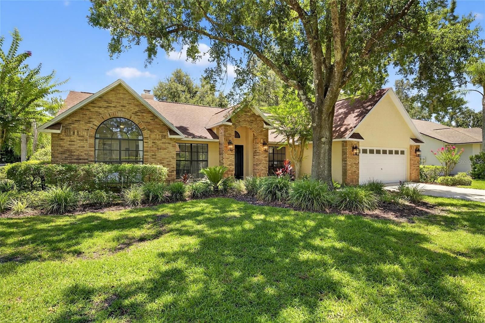 SIZZLING….THIS POOL HOME IS A WINNER —Located in the inviting gated River Hills Golf Course community with NO CDD fees, this fully upgraded 3-bedroom, 3-bathroom POOL home with a 2-car garage is 100% move-in ready! From the moment you step inside, you're welcomed by light, neutral paint tones that complement any décor. As you enter through the foyer, you'll find flexible office or den spaces on either side—perfect for remote work, a formal sitting room, music room, or cozy reading nook. Continue through the home, and you’ll step into a bright, open-concept layout, where the family room seamlessly connects to the kitchen. Natural light floods the space through large windows and pocket sliding glass doors, creating an airy, inviting atmosphere ideal for both everyday living and entertaining along with a woodburning fireplace for the winter nights. The home features Luxury vinyl flooring throughout the main living areas and all bedrooms—no carpet anywhere! Striking large marble tile in the kitchen and bathrooms, with tile continuing up the bathroom walls for a polished, high-end look. The chef’s kitchen is stylish and functional, offering Stunning quartz countertops with a matching backsplash, Warm honey oak cabinetry with two lazy Susans for added storage, Stainless steel appliances, dinette nook, Open views of the living and pool area, Multiple pockets sliding doors lead out to a spacious covered lanai and screened-in pool (38x18), and a BONUS a small gated dog run surrounded by a lush hedge for privacy—making it the perfect space to entertain or unwind in peace. The owner’s suite is a relaxing retreat featuring A generous walk-in closet, Dual vanities, A garden tub and walk-in shower, Private wash room, Pocket sliding door with direct access to the pool. In this designed split floorplan, two additional spacious bedrooms are situated on the opposite side of the home, offering privacy and comfort. They share a hall bath, while a separate suite features its own private bathroom that also serves as a convenient pool bath. Throughout the home, you'll also find modern light fixtures, ceiling fans, chair railing, linen closets, inside laudry room (washer & dryer included) water softener and thoughtful upgrades that make this home truly stand out. Bring toothbrush & move in! The community has two entrances are gated and manned by a guard 24/7. This golf course community is zoned for A+ schools! Driving down the magnificent tree lined main road, looking up at the beautiful oak canopy, you will easily see why River Hills is such a beautiful place to call home. Homeownership includes resident social access to the community’s amenities, covered by the quarterly HOA assessment. Whether you're an avid golfer, tennis enthusiast, swimmer, or simply looking for a vibrant and welcoming social atmosphere, River Hills offers the exclusive feel of a different lifestyle—without the high cost.