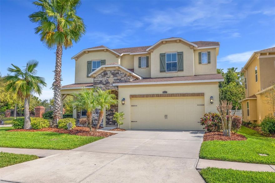 One or more photo(s) has been virtually staged. Tucked behind the gates of Bellafield within the highly sought-after Seven Oaks community of Wesley Chapel, this expansive executive-style residence offers nearly 3,500 square feet of thoughtfully designed living space with 4 bedrooms, 2.5 bathrooms, + LOFT, + ADDITIONAL OVERSIZED BONUS/MEDIA ROOM, and a functional open-concept layout designed for both elevated entertaining and everyday comfort. Loaded with upgrades within this rare floor plan, the owners have taken immaculate care of the home from top to bottom. From the moment you step inside, the home showcases soaring ceilings, abundant natural light, formal and casual living spaces, and a layout that lives much larger than expected. The gourmet kitchen serves as the centerpiece of the home, featuring an oversized center island, rich 42-inch cabinetry with crown molding, beautiful stone backsplash detail, stainless steel appliances, dual full-sized ovens, a 5-burner range, walk-in pantry, and an additional butler’s pantry seamlessly connecting the formal dining room to the kitchen and great room for effortless hosting. Sliding glass doors off the additional eat-in kitchen area create a seamless transition to the covered lanai and backyard space, embracing true indoor/outdoor Florida living. Privately positioned on the first floor, the spacious primary suite offers a true retreat with a spa-inspired en-suite bathroom complete with dual vanities, soaking tub, oversized walk-in shower, and an expansive walk-in closet. The first floor also features a dedicated laundry/mud room with direct garage access and a convenient half bath for guests. Upstairs, the home continues to impress with three additional bedrooms, a full bathroom, open loft space, and a massive bonus/media room with prewiring already in place for a home theater, game room, secondary living area, office, gym, or flex space tailored to your lifestyle. Significant updates include new HVAC systems (2024), fresh interior paint throughout (2026), and upgraded epoxy garage flooring. Beyond the home itself, residents of Seven Oaks enjoy access to resort-style amenities including a clubhouse, multiple pools, splash park, fitness center, tennis and basketball courts, playgrounds, and scenic walking trails. Conveniently located near top-rated schools, Moffitt Cancer Center, The Shops at Wiregrass, Tampa Premium Outlets, premier dining, entertainment, and major highways with direct access into Tampa, this is an exceptional opportunity to own a spacious, move-in-ready home within one of Wesley Chapel’s most established and desirable master-planned communities.