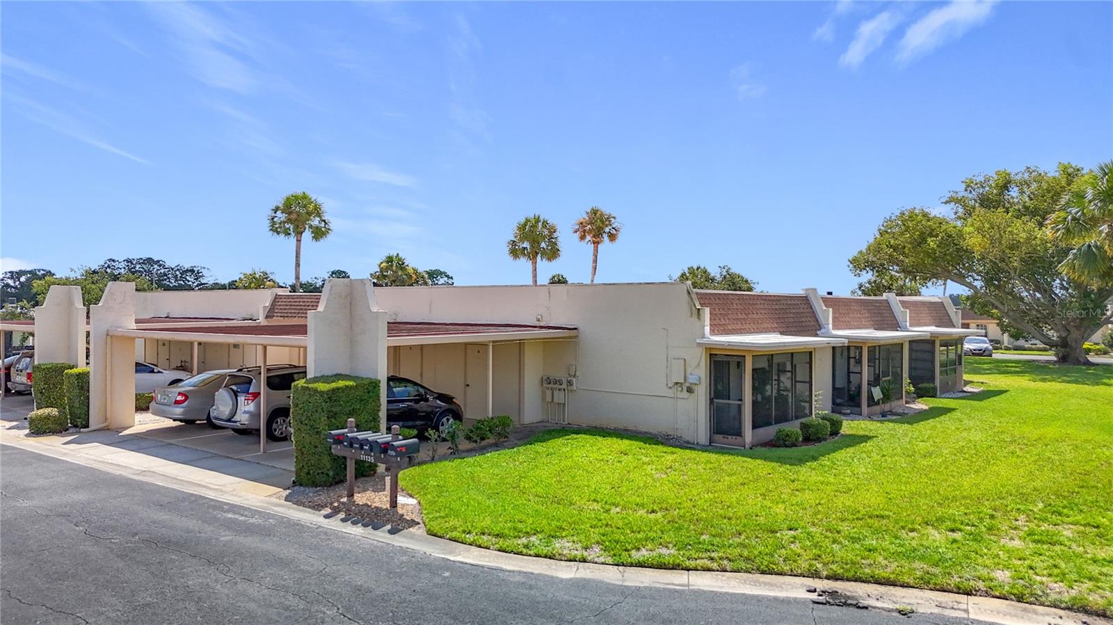Welcome to this charming 2-bedroom, 2-bathroom condo in the desirable Timber Oaks! This lovely unit features an eat-in kitchen. A stackable washer and dryer, the screened-in lanai, carport parking, and a dedicated storage closet. Offering a turnkey opportunity for seasonal or year-round living. Community amenities include a swimming pool, a spa, tennis courts, a clubhouse, a fitness center, billiards, a library, and more. Monthly fees include cable TV, internet, water, sewer, trash, exterior maintenance, and building insurance. This home is conveniently located near shopping, dining, medical facilities, and US-19, providing a comfortable 55+ community.