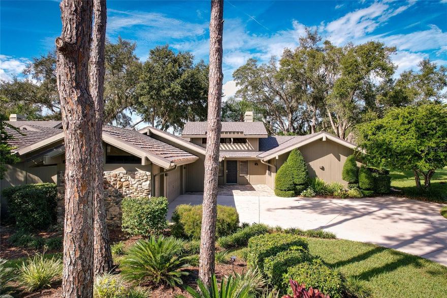 If you are looking for a home that is the perfect blend of luxury, functionality, and a breathtaking setting, that offers a lifestyle that caters to both relaxation and entertainment, THIS IS THE HOME FOR YOU! This 3 bedroom/ 3 bath, 2,483 sq ft maintenance-free home is COMPLETELY RENOVATED INSIDE  and not only overlooks a gorgeous pond but is also the 8th hole of the BEAUTIFUL Saddlebrook Golf Course! Enjoy the gorgeous sunsets and the water/golf course view from not just your patio but also your living room, family room, kitchen, master bedroom, and master bath! The abundance of natural light that flows through the large windows, sliding glass doors, and skylights creates a bright and airy atmosphere that showcases all the beauty of the backyard and golf course. This open-plan cluster home has all NEW Engineered hardwood throughout!  The kitchen truly is a chef's dream! The chef's dream kitchen is equipped with top-of-the-line amenities, new custom-designed cabinets, luxury high-end Quartz Countertops, a built-in microwave, stainless steel appliances, built-in double wall gourmet ovens, a range hood, an induction top cooktop, a pull-out pantry, and a wine cooler/beverage fridge, perfect for entertaining. The open layout and eating bar area make it perfect for both cooking and entertaining. The kitchen opens up to the formal dining room area overlooking those gorgeous views. Two of the three bedrooms have their own beautifully renovated private bathrooms, as well as walk-in closets with closet organizers/shelving. The master bath, with its double sink vanity and large garden tub, offers a relaxing retreat after a day of golf.  The oversized back porch with its new ceramic tile, drain system, and breathtaking views is perfect for entertaining or simply enjoying the panoramic surroundings. It truly is one of the best views in all of Saddlebrook! The family room, is complete with a wood-burning fireplace and hurricane-impact sliding glass doors, providing a cozy and inviting space for relaxation. The home's new hurricane/storm-rated sliding glass doors and plantation shutters/electric roll-up shades add privacy and a layer of safety and protection to the home. High ceilings and ample closet and cabinet space throughout the home offer practical storage. The spacious 2.5 oversized car garage has plenty of room to park your cars as well as a separate space for your golf cart. The HOA fee covers the roof, grounds, landscape maintenance, pest control of the exterior, building maintenance and exterior insurance,  pool maintenance and 24-hour guarded gates. Saddlebrook offers two of Florida's most beautiful pristine golf courses and has 45 tennis courts where many professional tennis players have played! The home is close to Wire Grass, the Outlet Mall, I-75, Hospitals, Shopping, and Restaurants. Make your appointment to see this beauty today!