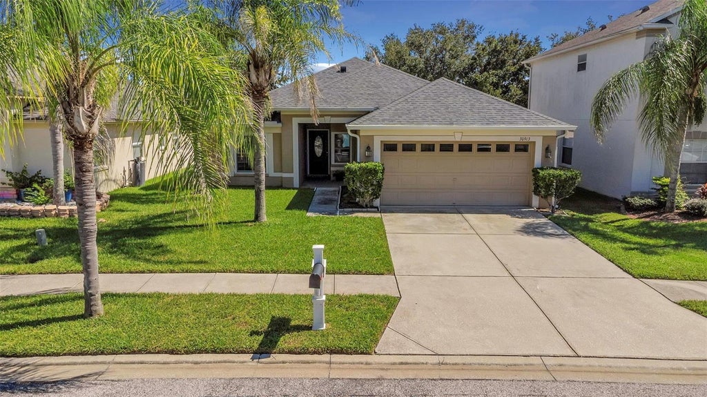 Photo of 30913 Bridgegate Drive, Wesley Chapel, FL 33545 (MLS # TB8558476)