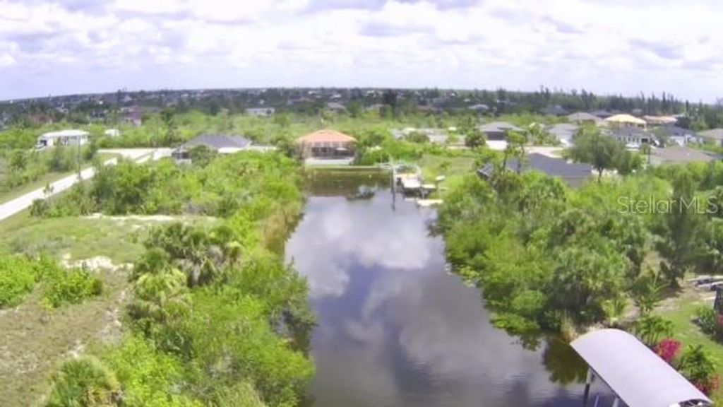 Photo of 10063 Lebanon Drive, Port Charlotte, FL 33981 (MLS # D6142759)