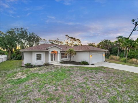 Photo of 2426 Music Lane, North Port, FL 34286 (MLS # A4691110)