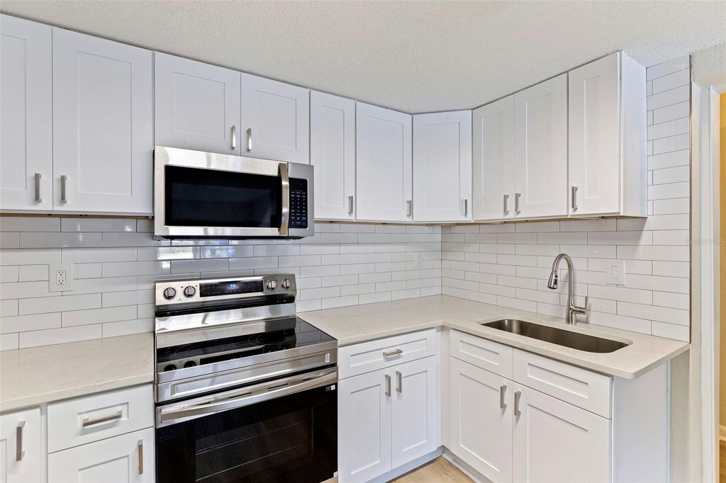 Photo of 1035 Martin Luther King Jr. Ave, Dunedin, FL 34698 (MLS # TB8475663)