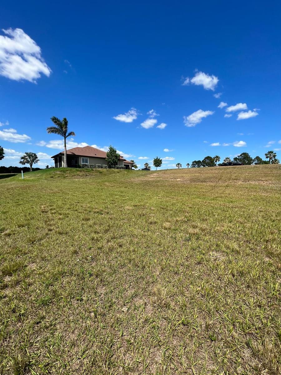 Located in the Water Ridge gated community, this exceptional 0.21-acre lot (127 feet deep by 71 feet wide) offers a rare chance to build your dream home. With two scenic ponds in the backyard and stunning views of Lake Alfred, this elevated lot is perfect for a home with a walk-out basement to take full advantage of the breathtaking surroundings.
Enjoy resort-style living with access to two luxurious pools, a lap pool, tennis courts, scenic walking trails, a fully equipped gym, and a community dock. The neighborhood also offers on-site boat and RV storage for added convenience. Plus, with easy access to major highways, you’re never far from shopping, dining, and entertainment.
Don’t miss out on this unique opportunity to build your custom home in one of the area’s most sought-after communities!