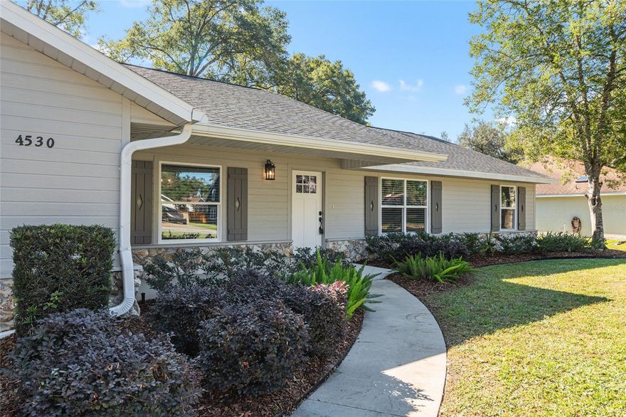 Located in the beautiful established neighborhood of Windermere Glen is this lovely Ranch style home that has been completely remodeled with all the upgrades! You'll fall in love with the huge galley kitchen with granite countertops & quality appliances all open to the living and dining rooms for intimate family gatherings and entertaining. A large bonus/family room off the kitchen can be used for multiple purposes and a big plus to this home. The intimate living room hosts an impressive rock fireplace (decorative only). Other features include a private office, two large ensuites, three full baths, a coat closet, three linen closets, and large closets in each of the bedrooms providing ample storage. Luxury vinyl plank flooring throughout. A large inviting concrete patio and a brand new Bullfrog Hot Tub/Spa are all waiting for you in your privacy vinyl fenced backyard! This home truly checks all the boxes for the best in central Florida living. Roof 2021, new windows & doors 2022, HVAC 2021, garage door opener 2023, custom window blinds, freshly painted interior & exterior 2022, and all have been meticulously maintained! Make your appointment to tour this fabulous home soon, you'll be happy you did.