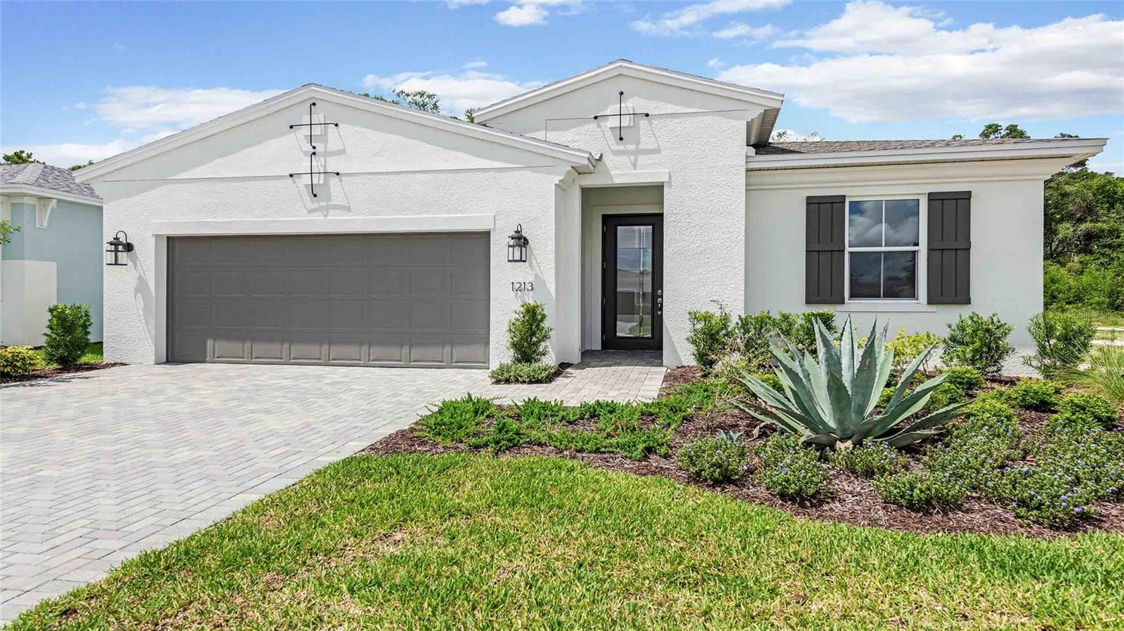 ***NEW CONSTRUCTION***The Kate floorplan offers a beautifully designed 3-bedroom, 2.5-bath home, just minutes from Club Cresswind. This thoughtfully laid-out residence boasts a Private Study for added versatility and a spacious Great Room that’s filled with natural light, creating a welcoming atmosphere. The contemporary kitchen features luxury veined quartz countertops, upgraded appliances, and an artisan backsplash tile that complements the crisp white cabinetry. Added touches like a pot and pan drawer cabinet and a 24” deep cabinet above the refrigerator with side panels elevate both style and functionality.
The Owner’s Suite is a serene retreat, offering privacy and comfort, while the en-suite bath features a frameless glass shower, dual vanities, and tile-to-the-ceiling in the shower for a spa-like experience. The walk-in closet connects seamlessly to the laundry room for ultimate convenience.
A stunning 16' sliding glass door opens to the spacious lanai, providing the perfect setting for relaxation or casual gatherings while being surrounded by a natural backdrop. Throughout the home, you’ll find 24x24 porcelain tile in the main living areas, offering a sleek, modern feel. The home also includes upgraded large cabinet crown molding, creating an elegant touch throughout.
With a 2-car garage and a smart, functional layout, this home combines modern comfort, style, and practicality for a living experience that’s as functional as it is beautiful.