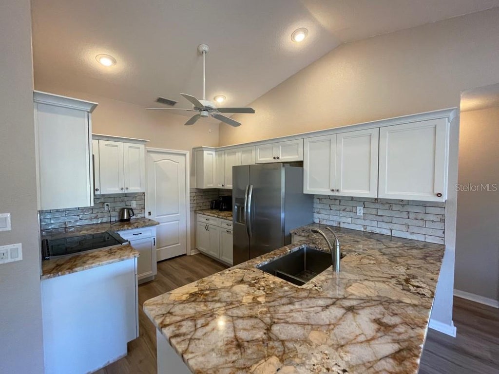 Photo of 7096 Ticonderoga Street, Englewood, FL 34224 (MLS # A4709518)