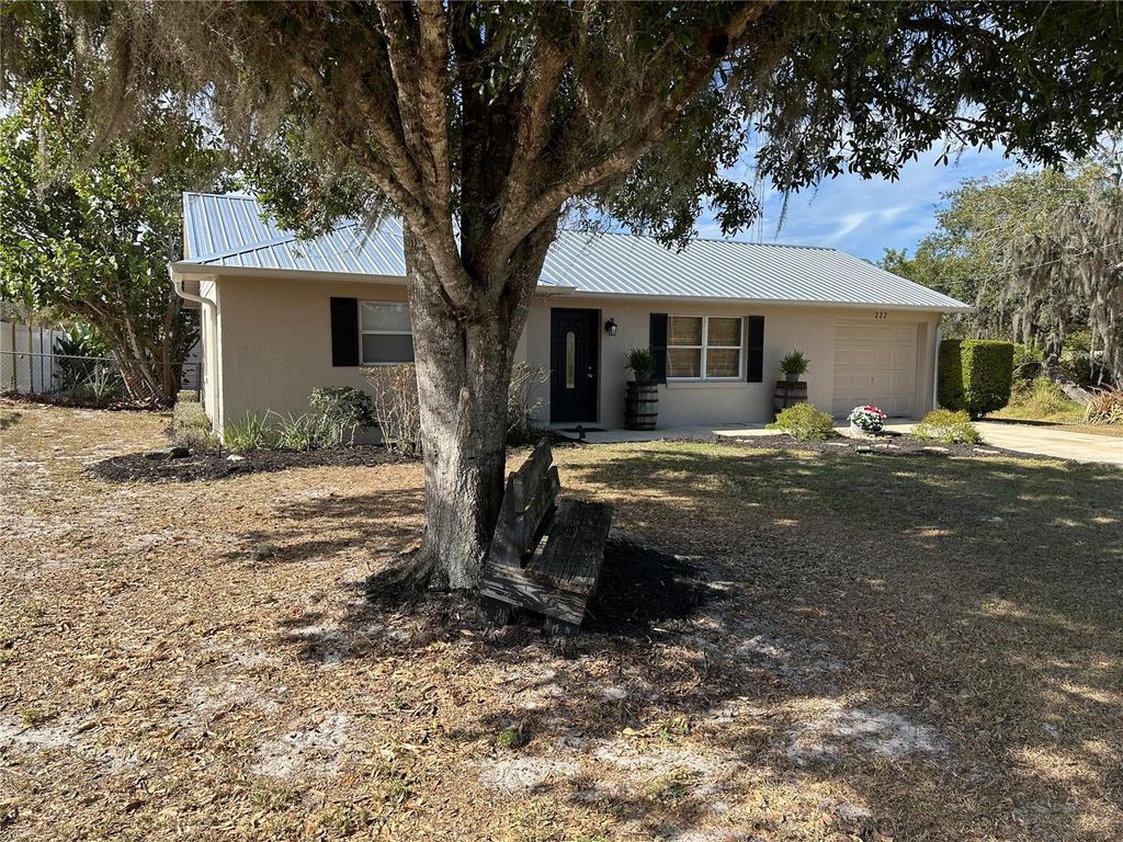 Photo of 222 Highlands Lake Drive, Lake Placid, FL 33852 (MLS # O6368412)