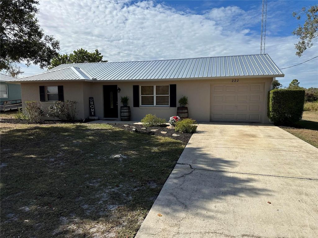 Photo of 222 Highlands Lake Drive, Lake Placid, FL 33852 (MLS # O6368412)