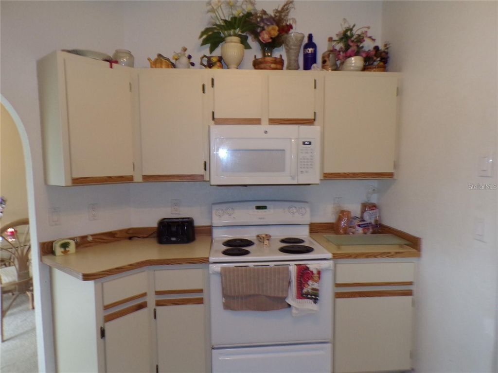 Photo of 1011 Tropical Avenue NW, Port Charlotte, FL 33948 (MLS # C7497085)