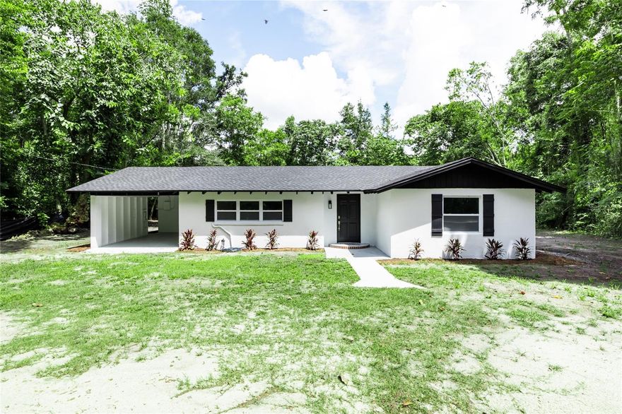 Move-in ready and beautifully remodeled, this charming 3 bedroom, 1 bath home which offers comfort, style, and convenience. 
• New roof providing years of worry-free living
• Brand new HVAC system for year-round comfort
• Durable vinyl plank flooring throughout
• New stainless steel appliances in the modern kitchen
• Fresh paint and updated finishes inside and out
Additional features include a carport and a laundry room with A/C located in the carport for easy access. Quarter acre lot, quiet street, laid back country living, minutes from the famous Suwannee River!