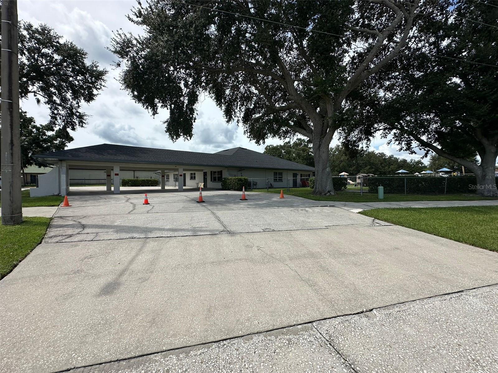 This versatile commercial space offers an exceptional opportunity in the heart of Poinciana, located just off Cypress Parkway with high visibility and easy access. Situated at 90 S Doverplum Avenue, the property features ample interior space ideal for a daycare, preschool, medical practice, veterinary office, or other professional use. The layout offers flexibility for multiple rooms, reception or lobby areas, offices, and restrooms. Conveniently located within a busy retail and residential corridor, this site benefits from strong traffic counts, established neighboring businesses, and close proximity to schools, parks, and residential communities. This location offers a direct, no-hassle route for families and professionals commuting from Kissimmee, St. Cloud, or surrounding areas.