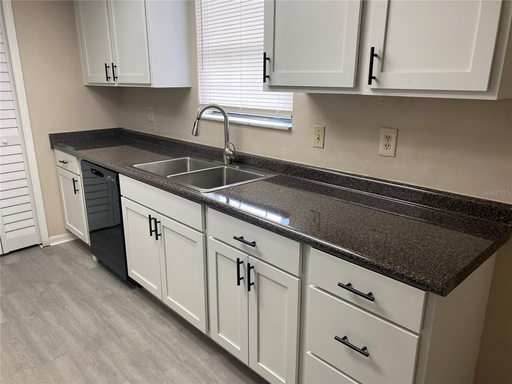 Photo of 6763 Magnolia Pointe Circle, Orlando, FL 32810 (MLS # O6438466)