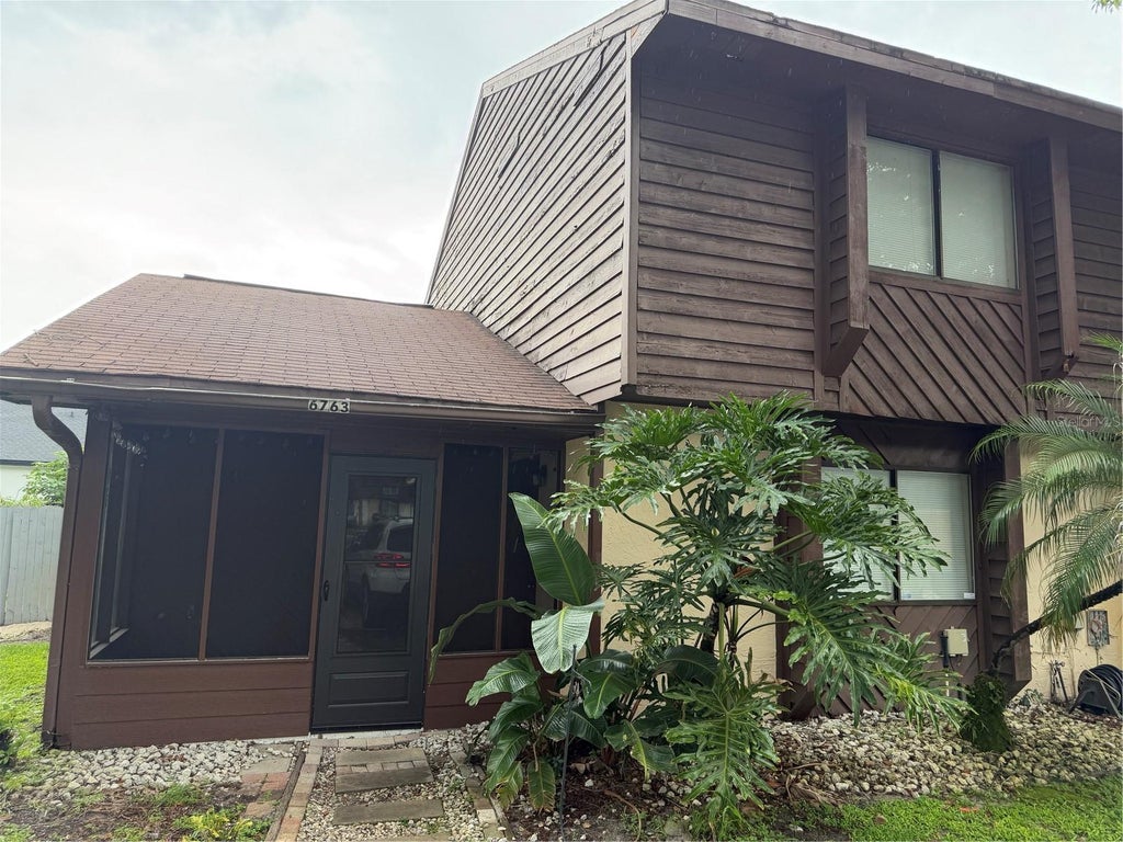 Photo of 6763 Magnolia Pointe Circle, Orlando, FL 32810 (MLS # O6438466)