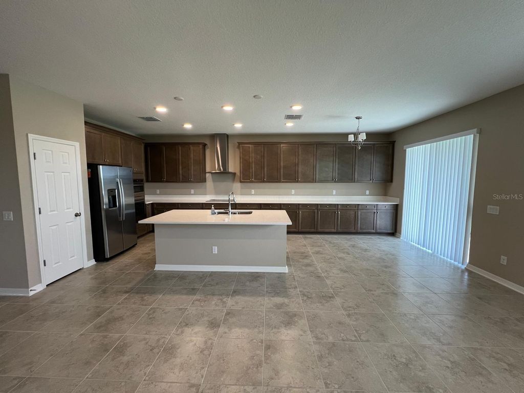 Photo of 9429 Crescent Ray Drive, Wesley Chapel, FL 33545 (MLS # O6381192)