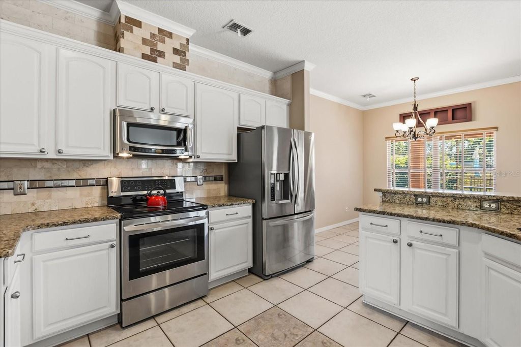 Photo of 1318 Lucky Pennie Way, Apopka, FL 32712 (MLS # O6393366)