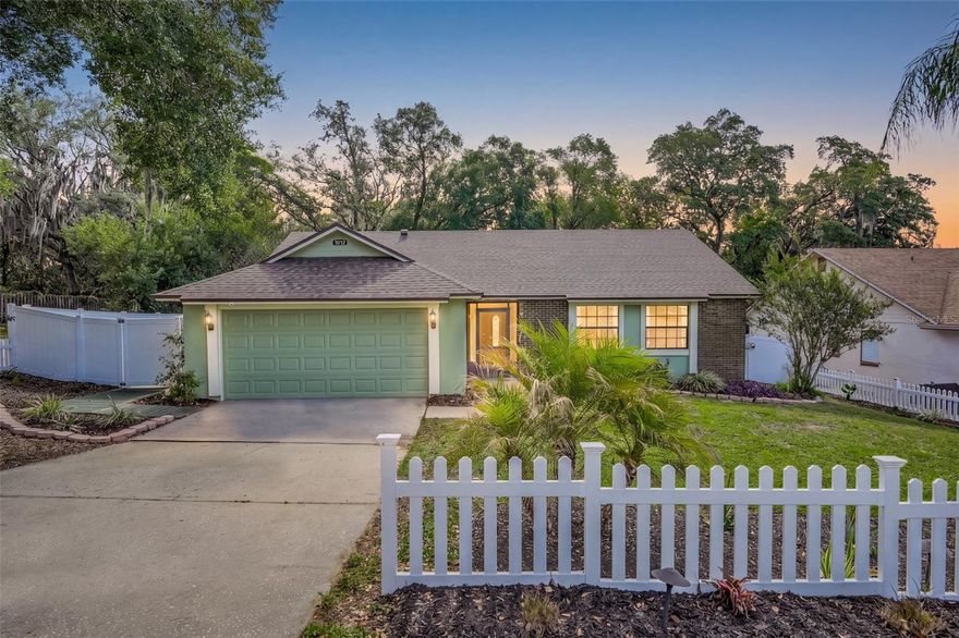 One or more photo(s) has been virtually staged. Welcome to this charming and beautifully maintained 3-bedroom, 2-bath home in the established Willow Creek community. Offering 1,330 square feet of comfortable living space, this property is surrounded by lush manicured gardens and mature trees, creating a peaceful private retreat in the heart of Orlando with NO HOA.
Inside, the home has been thoughtfully updated with wood laminate and ceramic tile flooring throughout. The bright, airy kitchen features real wood cabinetry with soft-close upgrades and a built-in water filtration system, blending style and functionality perfectly.
Step outside to enjoy the spacious screened lanai overlooking your own backyard oasis. The beautifully landscaped yard includes an above-ground pool, custom-built deck, outdoor bar, landscape lighting, and an irrigation system designed for easy maintenance and year-round enjoyment. There is also ample outdoor storage for gardening tools and equipment. The fully fenced backyard, enclosed with attractive vinyl fencing, offers both privacy and security.
Additional updates include a new roof installed in 2023 and a new hurricane-rated garage door added in 2025. With exceptional curb appeal, serene outdoor living spaces, and even a classic white picket fence, this home is truly a hidden gem.
Conveniently located with easy access to SR 414, SR 429, and SR 408, you’ll enjoy quick commutes along with close proximity to shopping, dining, and entertainment throughout Orlando.