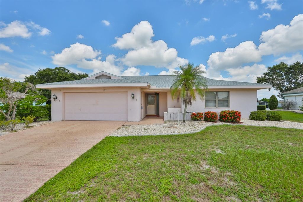 Photo of 1709 S Pebble Beach Boulevard, Sun City Center, FL 33573 (MLS # TB8417573)