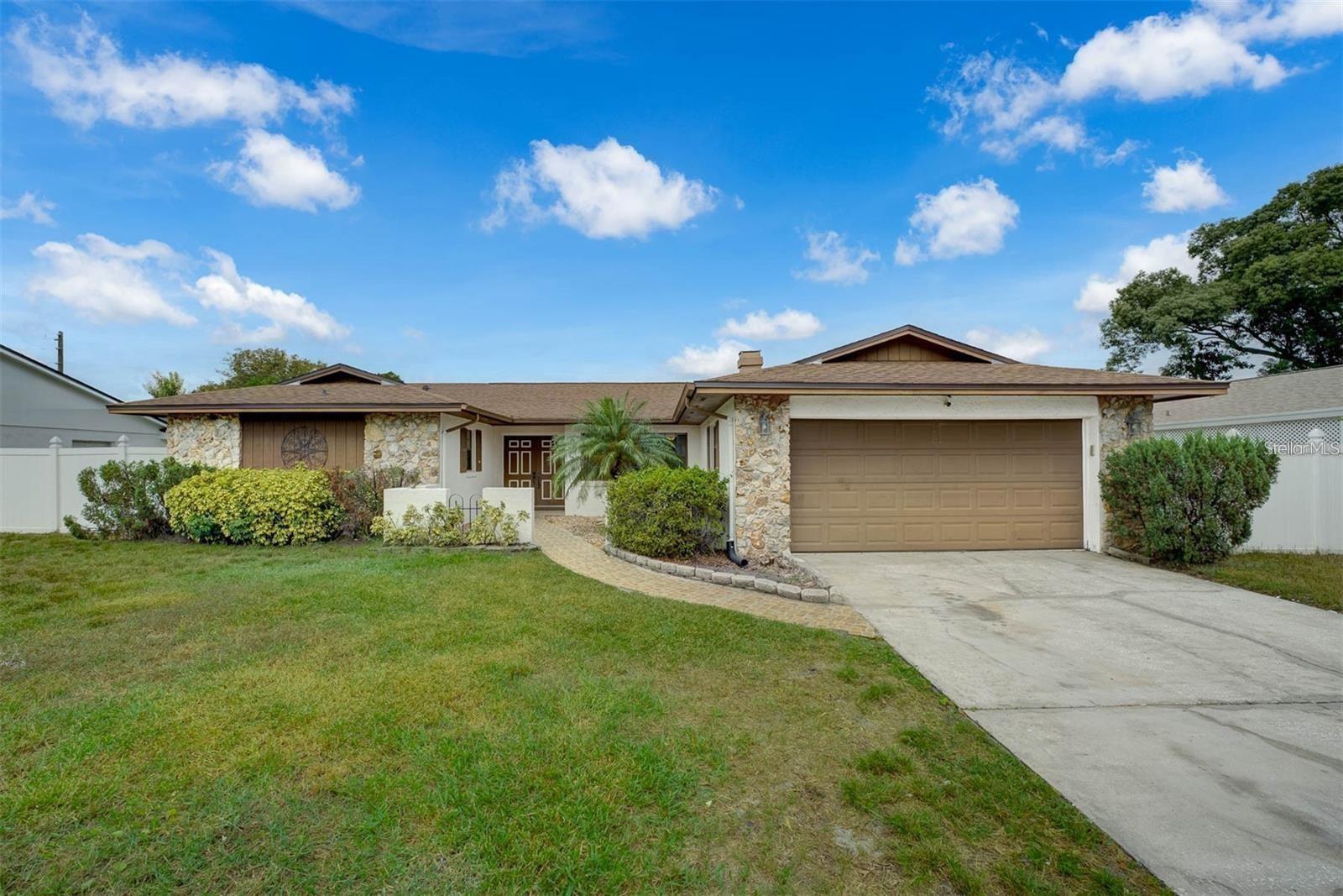 Charming 3-Bed, 2-Bath Home in Dr. Phillips – Move-In Ready & Fully Renovated! fenced backyard Just minutes from the YMCA, major theme parks, and shopping centers