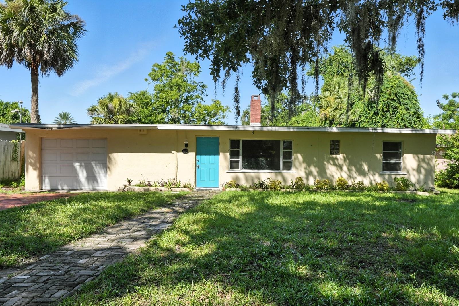 Nestled beneath a canopy of majestic oak trees, this inviting 3-bedroom, 2-bath home offers the perfect blend of classic charm and modern comfort. Located in a desirable Ormond Beach neighborhood, this property has never experienced flooding or any hurricane damages, giving you peace of mind year-round. Step inside to discover a warm and welcoming interior featuring brand new carpet and not one, but two cozy fireplaces — perfect for relaxing evenings or entertaining guests. The home also boasts a 2018 roof, updated electrical breaker panel in 2023, new breaker box and wiring to stove, and new breaker box and wiring in the utility room at the rear of the house. Enjoy the comfort of spacious living areas, a functional kitchen ready for your personal touches, and plenty of natural light flowing through the windows. Large flex room in the rear of the home can function as a secondary master suite or flex room. Front half of the house was built in 1946, rear half in 1958
. Mirrors in dining room are close to 100 years old, if buyer does not want, seller will take. Home is zoned Volusia County but on City
of Ormond Beach water. This home offers endless potential for its future buyer. Minutes from the river, shopping, and downtown Ormond Beach.