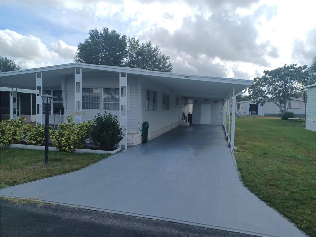 Photo of 34632 Sweetpea Lane, Zephyrhills, FL 33541 (MLS # TB8452258)