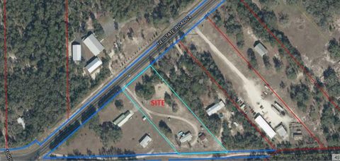 Photo of 9230 NE State Road 24, Bronson, FL 32621 (MLS # GC536342)