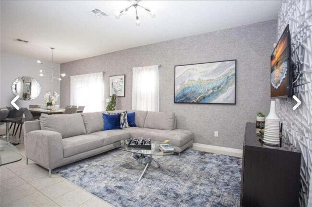 Photo of 1050 Las Fuentes Drive, Kissimmee, FL 34746 (MLS # O6432586)